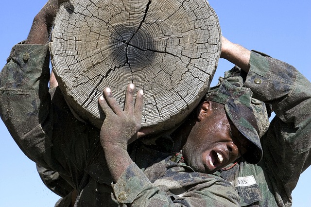 Team carrying a log